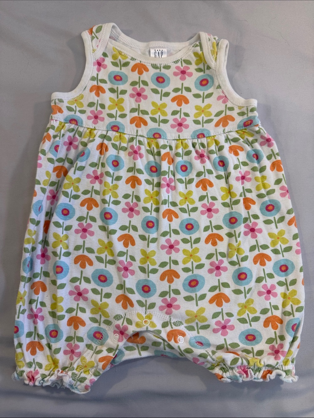 GAP White Floral Sleeveless Baby Romper with Pink, Blue and Orange Flowers